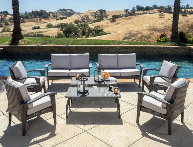 Wicker outdoor patio set with table and chairs