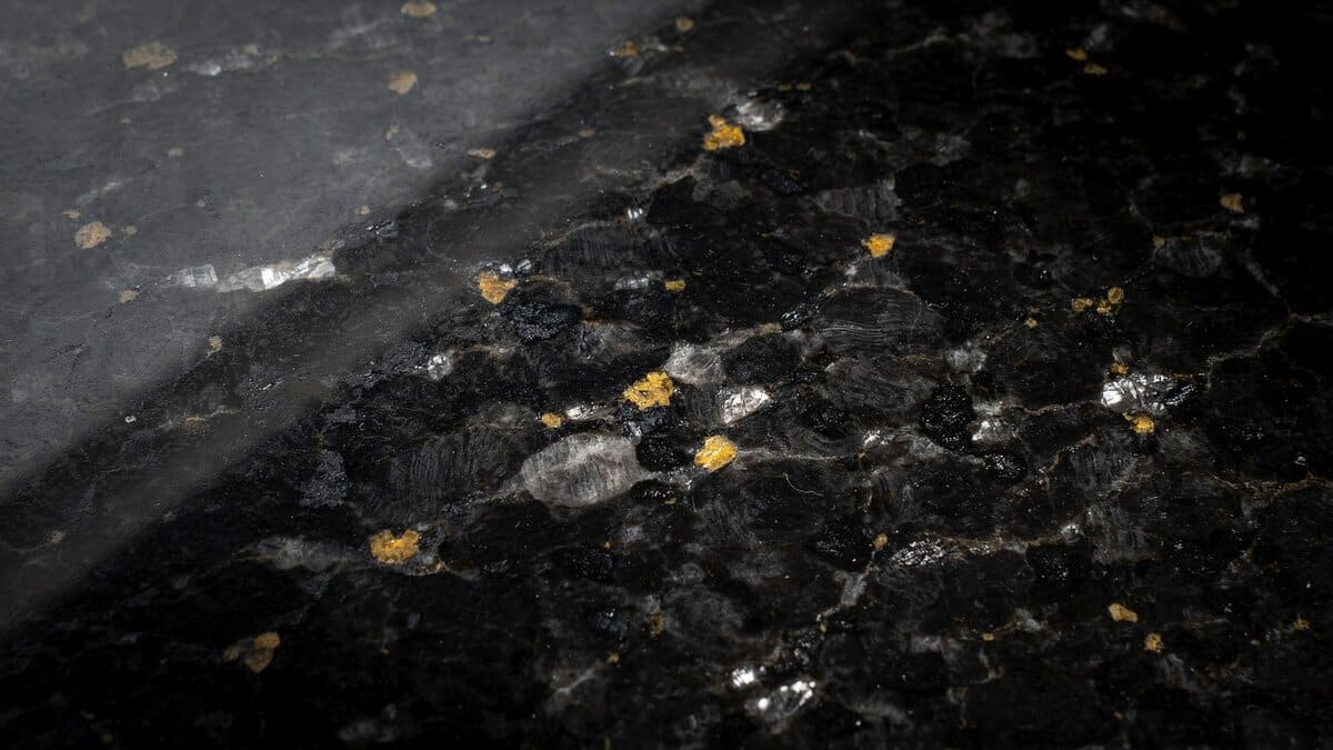 Polished Black Galaxy granite slab with sparkling gold and white mineral flecks