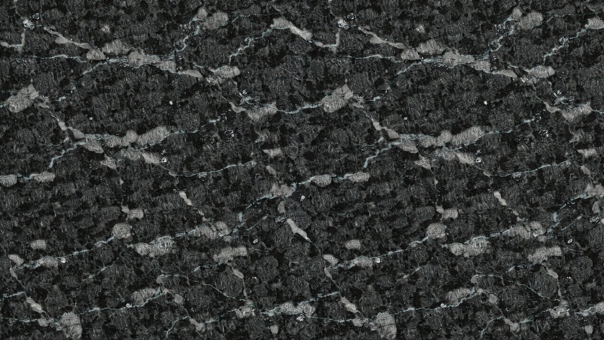 Polished Impala Black granite slab with silvery blend of black and gray minerals