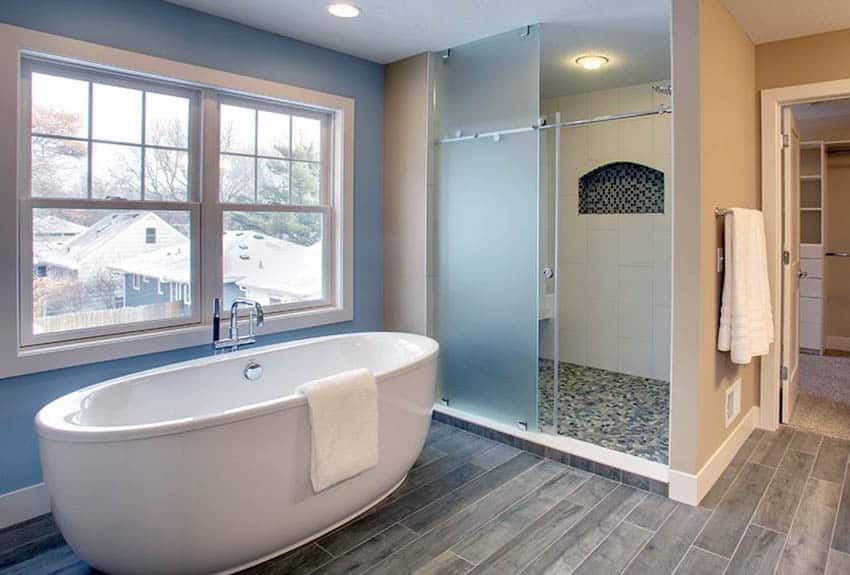 Bathroom with sliding door and mosaic tile 