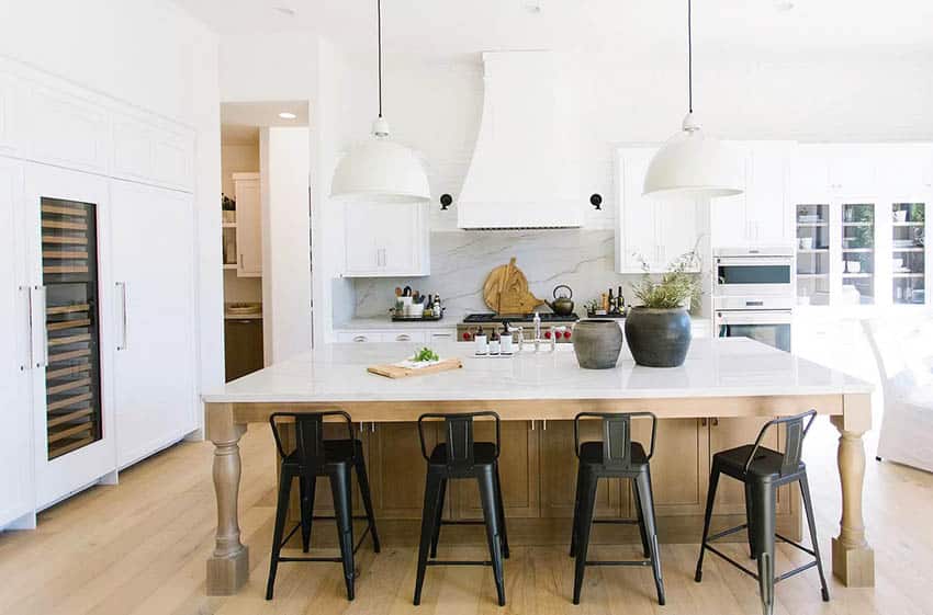 Chefs kitchen with marble and quartz countertops 