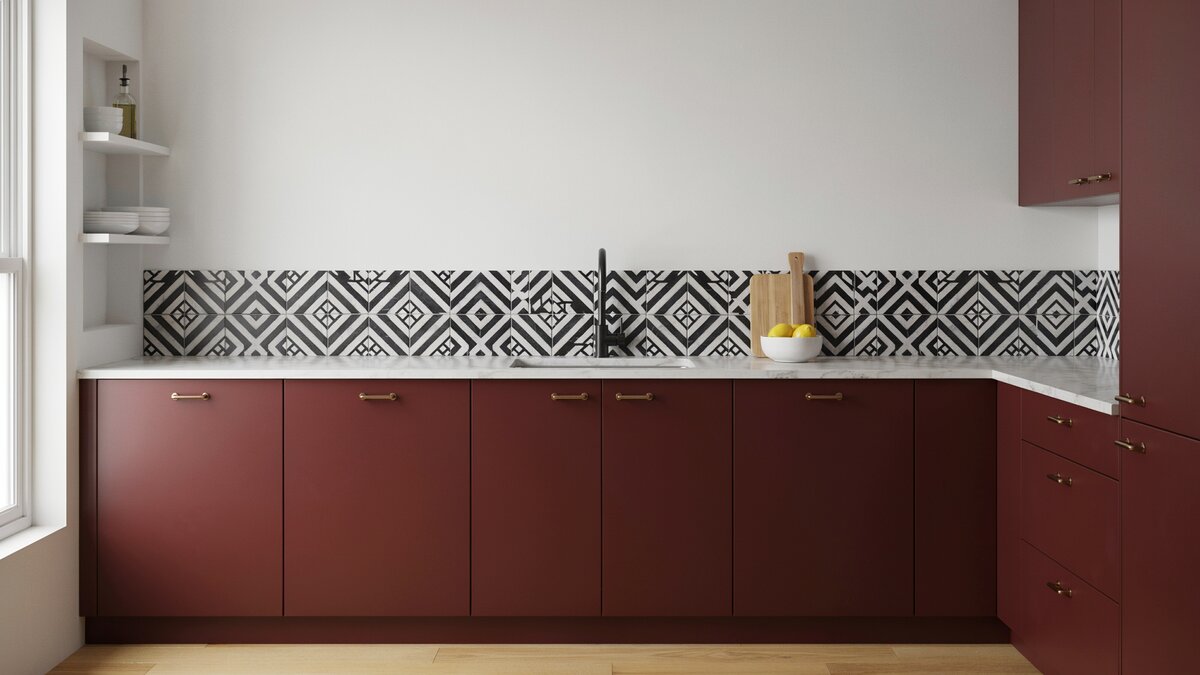 Black and white graphic mosaic backsplash behind a compact deep toned run