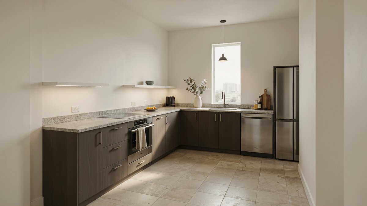 J shaped run of dark cabinets under pale gray granite and stone backsplash