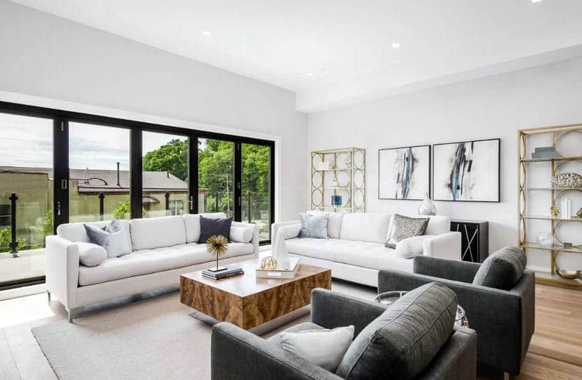 Contemporary living room with art and matching shelf racks