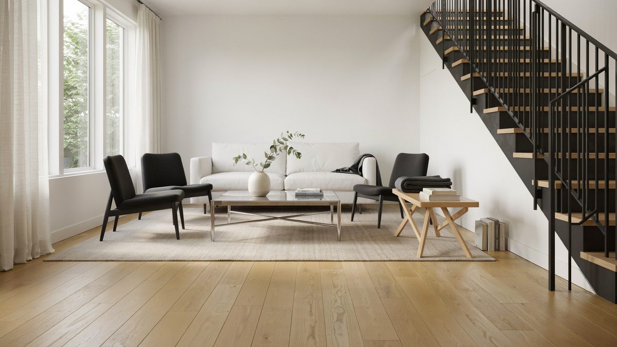 Modern wrought iron staircase, black accent chairs and steel table