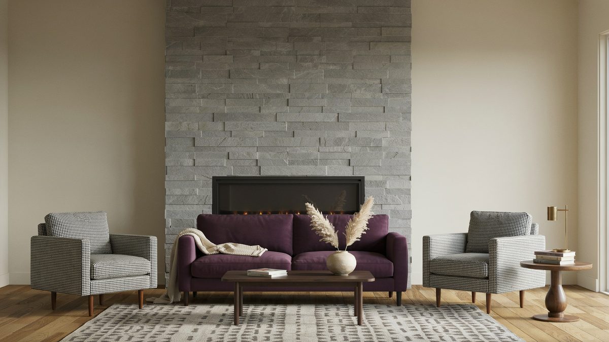 Oatmeal colored walls, upholstered chairs and pedestal side table