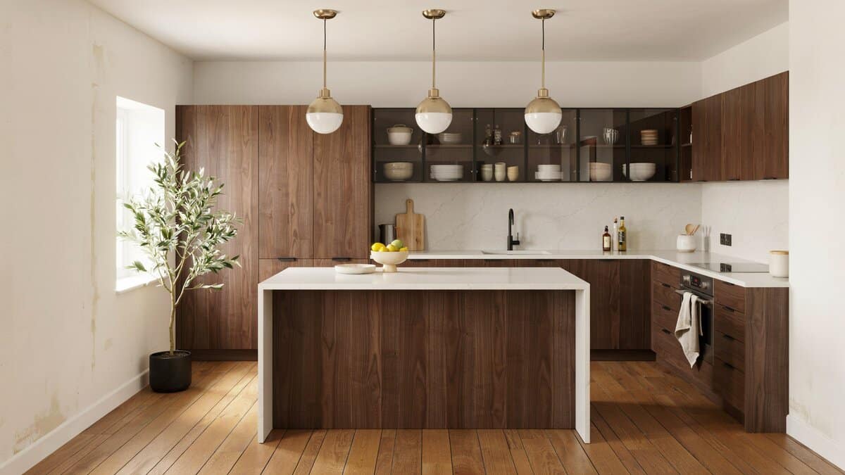 Globe pendants glowing over arctic white counters and glass front upper cabinets