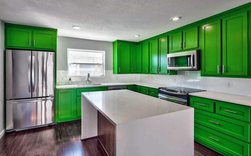 High gloss green kitchen cabinets with white quartz waterfall countertop island