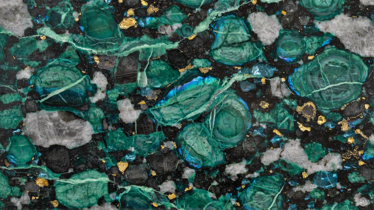 Peacock slab of teal rings and iridescent blue rims flecked with gold