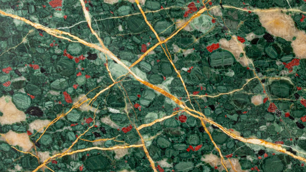 Rich green seaweed slab with gold veining and scattered red flecks