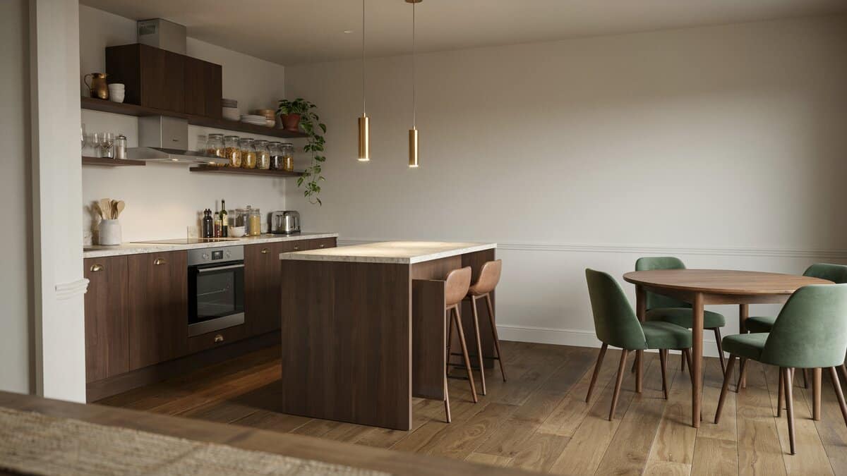 Green upholstered chairs beside a single level island and dark flat panel doors