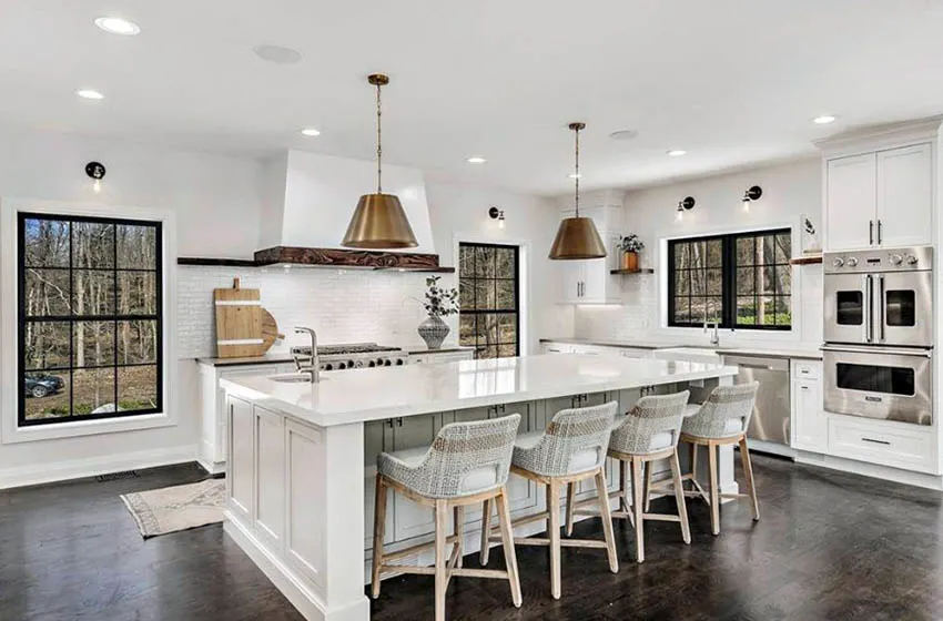 Beautiful l shaped kitchen with island white cabinets counter and backsplash
