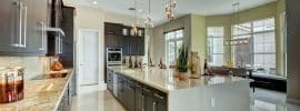 contemporary-kitchen-with-calacatta-gold-marble-floors-and-dark-cabinets