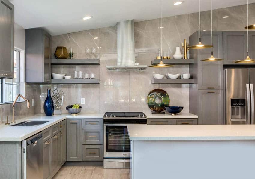 Kitchen with marble wall backsplash and light and dark grey cupboards