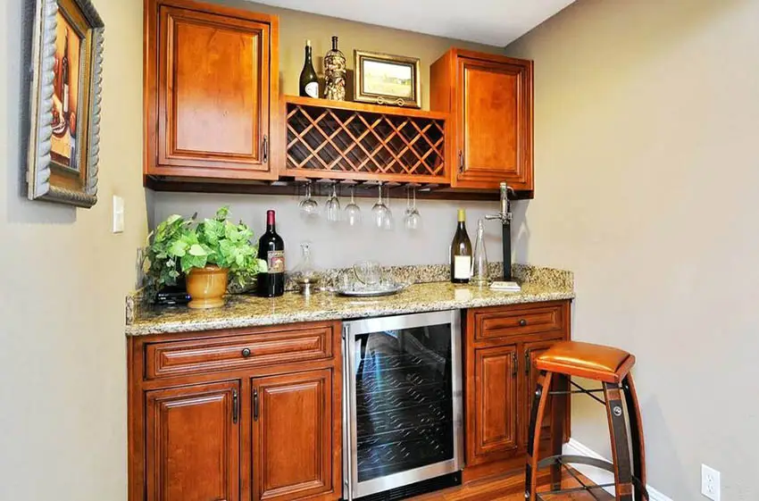 Custom home wine bar with fridge and wine rack