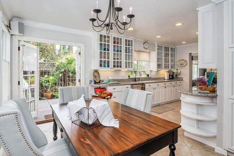 Farmhouse Dining Room With French Doors