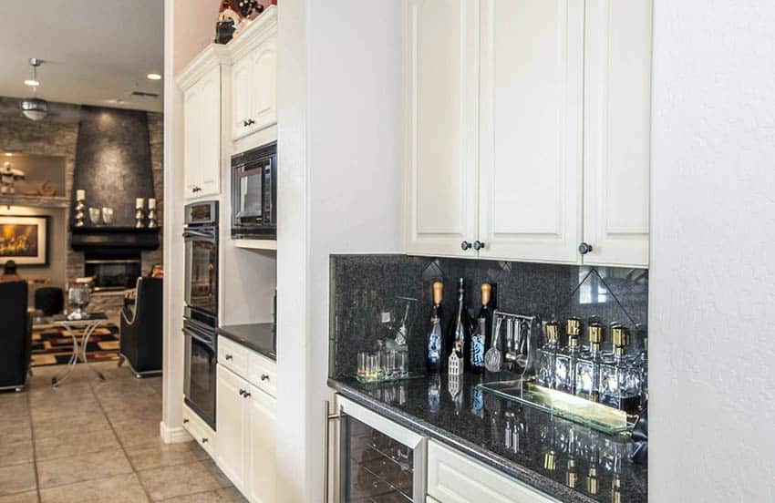 Home bar in kitchen with wine fridge