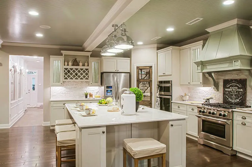 Traditional kitchen with l shaped design large island arctic white quartz beadboard ceiling panels