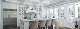 beautiful-kitchen-with-white-french-doors-box-ceiling-and-marble-island