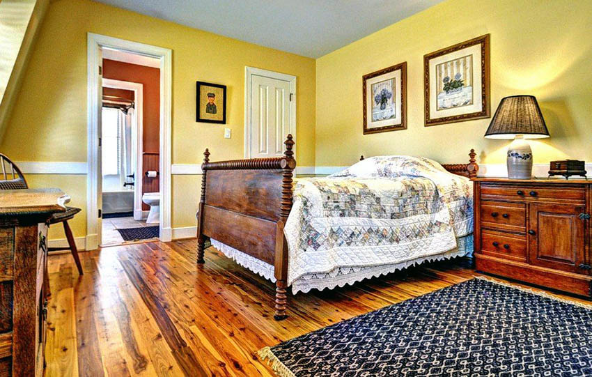 Bedroom with cypress hardwood flooring