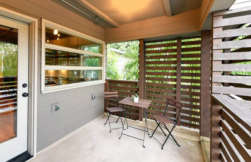 Covered porch with horizontal privacy fence