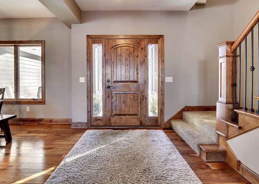 Entryway with solid plank walnut wood flooring