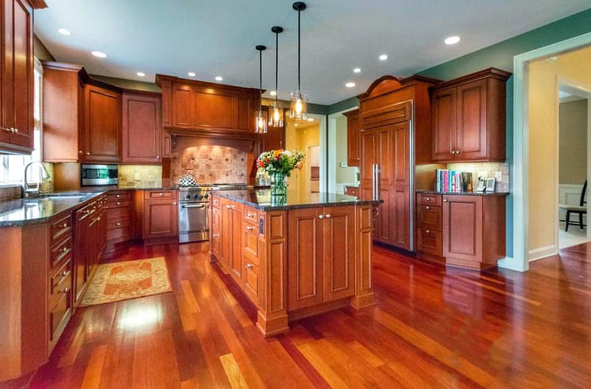 Kitchen With Cherry Cabinets And Cherry Hardwood Flooring 