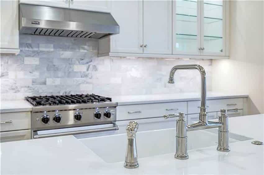 Kitchen with two handle bridge faucet