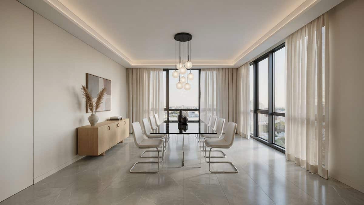 White cantilever chairs on pale porcelain tile beside floor to ceiling windows