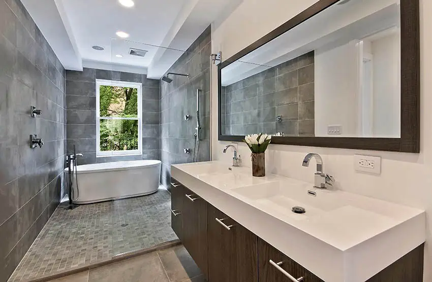 Modern bathroom with doorless shower and super white quartz countertops