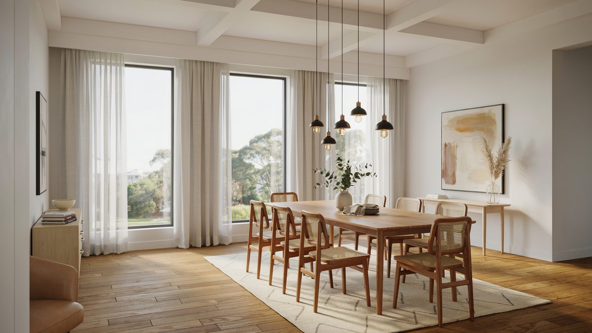 Warm oak table under a row of black mini pendants near tall windows