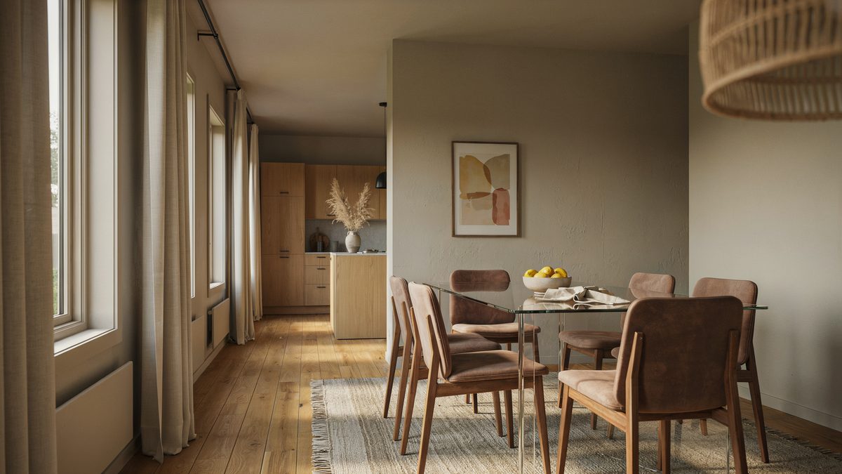 Wood table and leather chairs in a long open plan kitchen space
