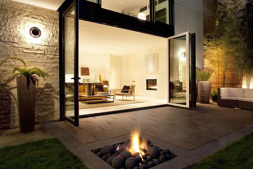 Modern patio with exterior metal doors