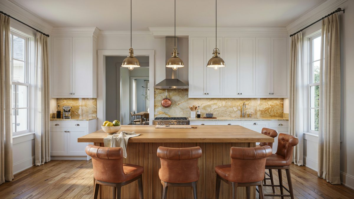 White cabinets with golden crystal granite and three metal pendant lamps