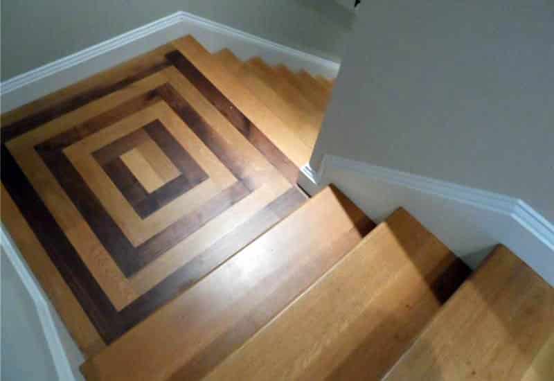Wood floor inlay on staircase