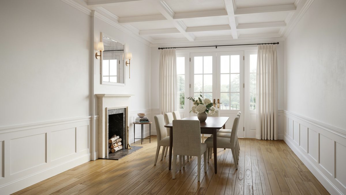 White wainscoting and coffered ceiling frame a walnut table near the fireplace