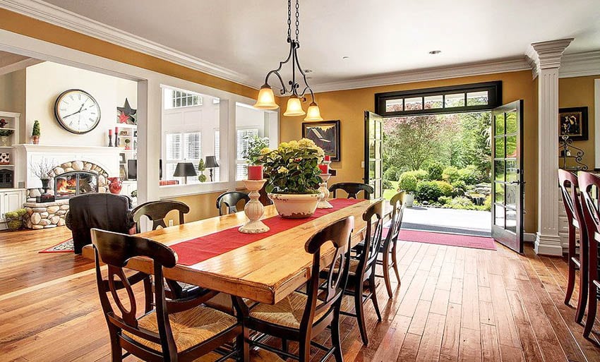 Dining room with traditional chairs and wood french doors