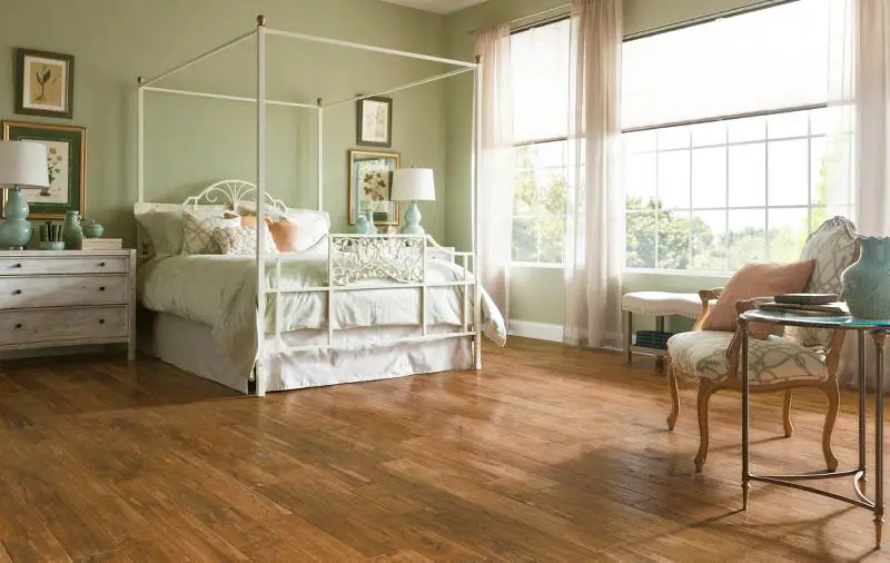 Hickory handscraped wood flooring in bedroom