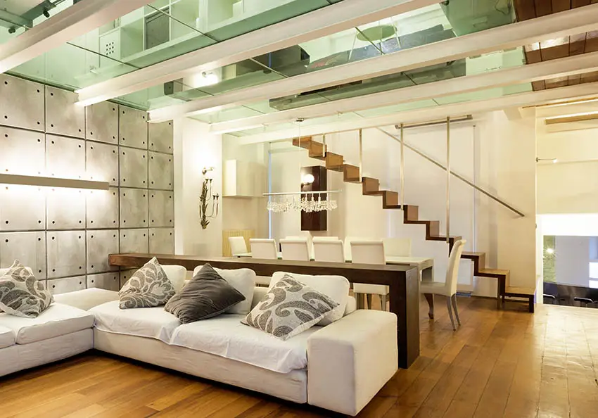 Large modern loft with staircase with chrome supports