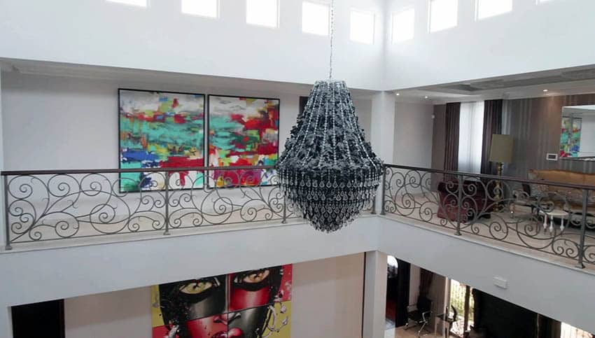 Second floor of a home that features an Art Deco style chandelier