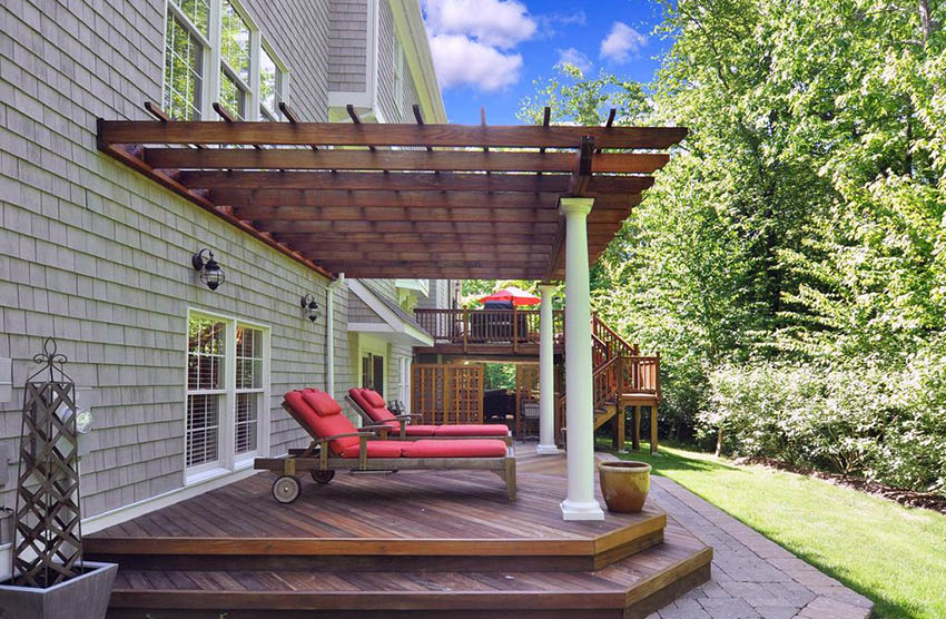 Traditional deck with chamfered corners steps and wood pergola