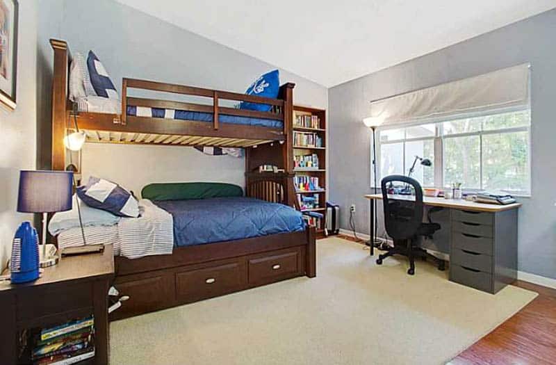 Boys bedroom with solid wood bunk beds and desk