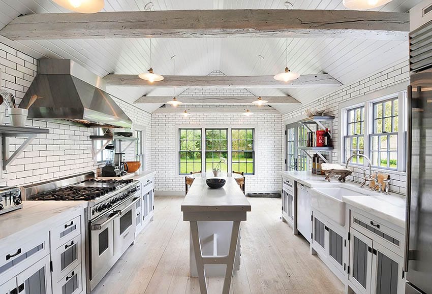 Contemporary kitchen with white and gray beadboard cabinets and bamboo flooring