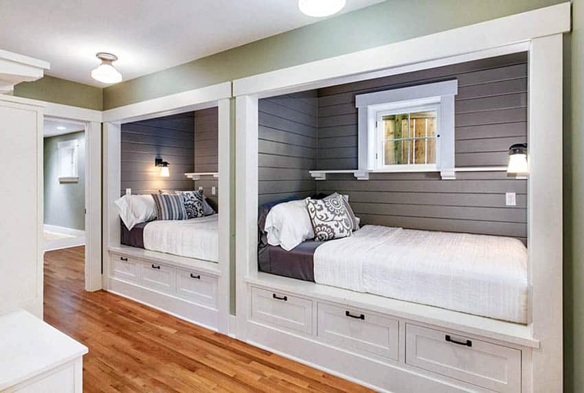 Cottage guest bedroom with built in bunk beds and storage