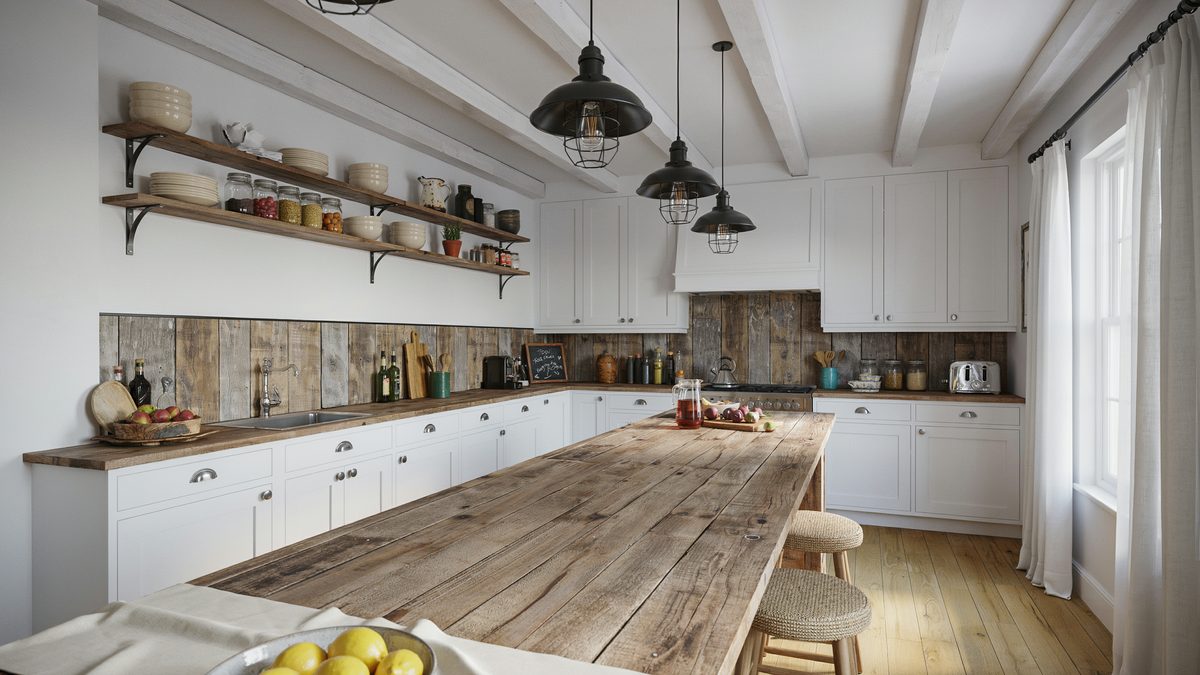 Long salvaged plank counter running past white cabinets and iron bracket shelving