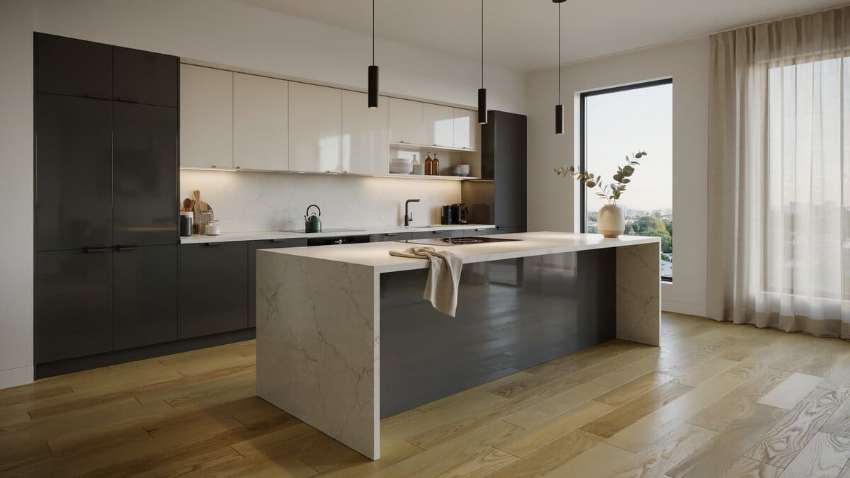 Two tone high gloss cabinets with an induction cooktop set in the island