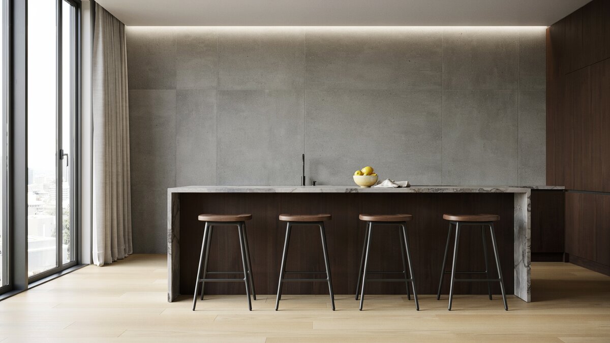 Concrete finish wall tiles behind a mahogany island topped with Carrara marble