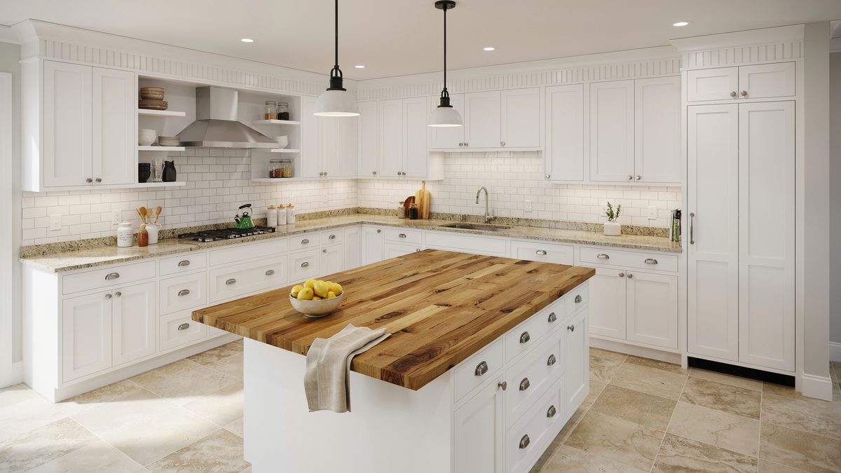 Butcher block island centered in a white shaker kitchen with granite perimeter counters