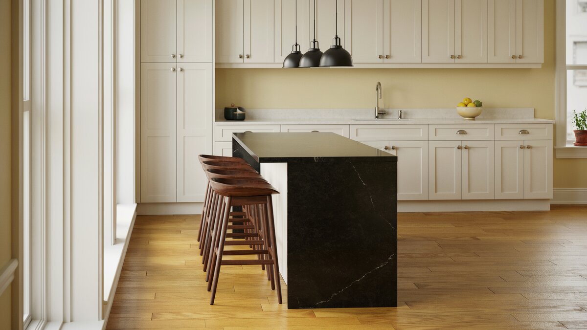 Yellow beige walls with an absolute black granite island and wenge stools