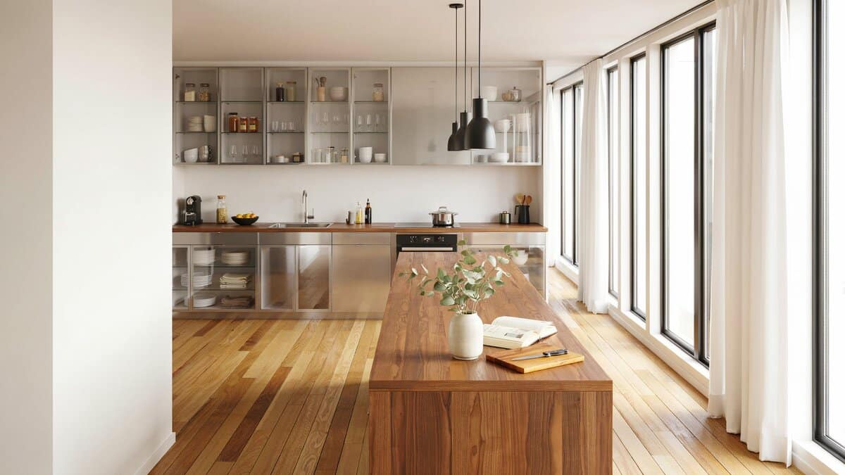 Glass front upper cabinets above thick walnut butcher block counters and wood floors